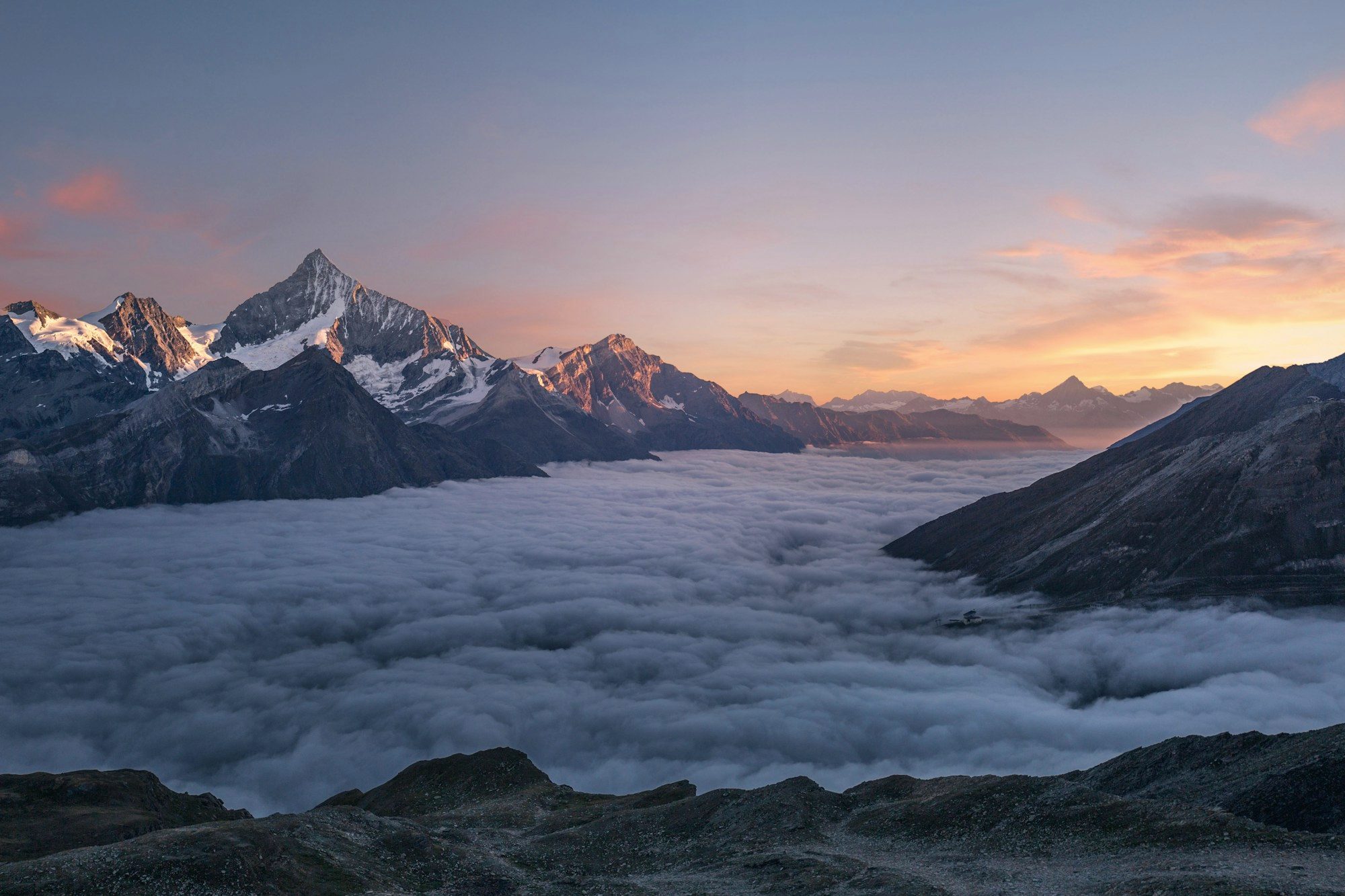 Alpine peaks above the clouds